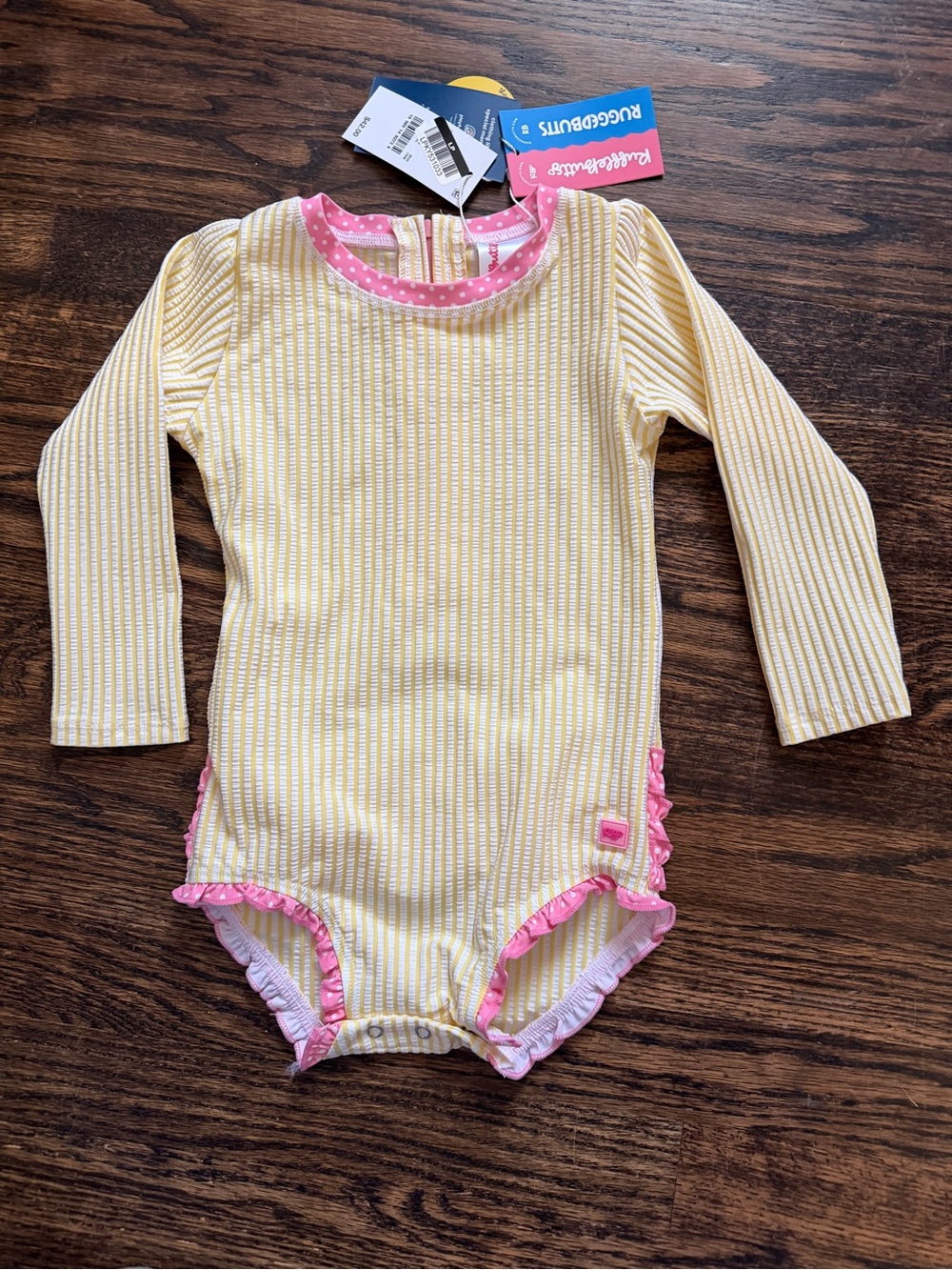 RuffleButts Toddler Girls’ Seersucker Long Sleeve One Piece Rash Guard Swimsuit